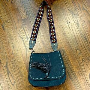 Steve Madden purse. Detailed strap.